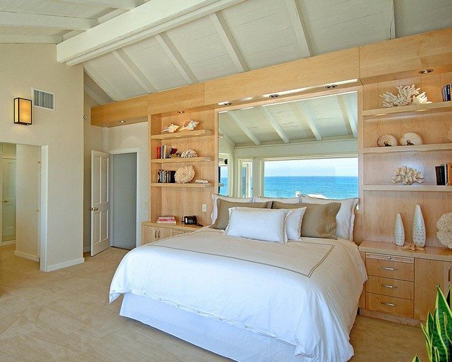 design looks loke on the ship or boat. big white double bedroom and wooden cabinet