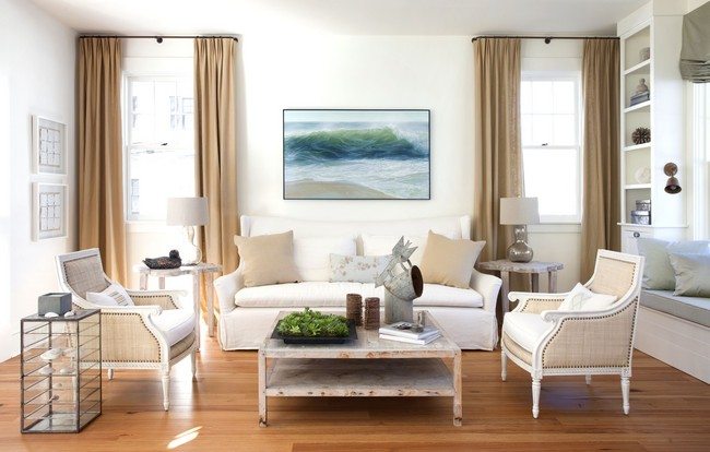 amasing coastal living with white loveseat and rustic armchairs on glossy wood laminate floor
