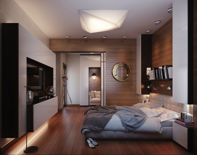 double bed on the wooden laminated floor without windows