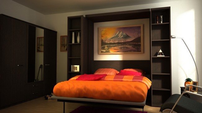 ikea murphy bed divider of the orange color with 2 pillows and one picture on the floor