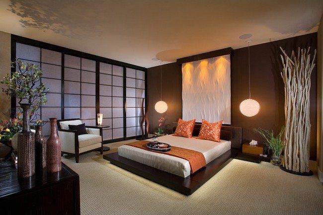 cosy style room with carpet on the floor and white wooden armchair with orange pillows and duvet