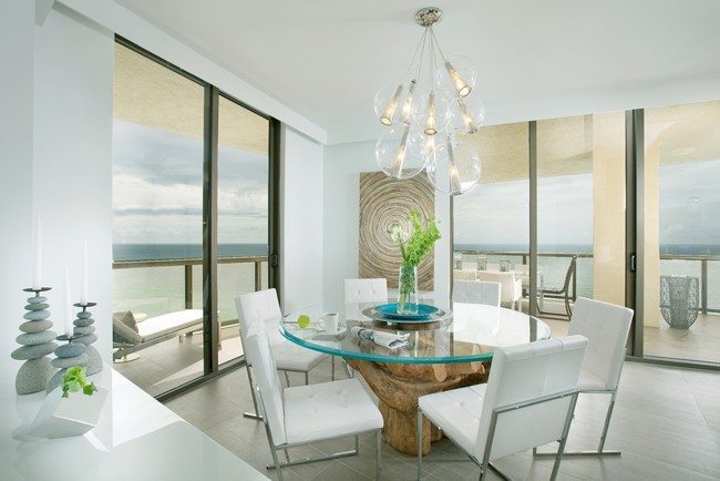 innovative coastal dining rooms with photo of coastal big windows and big roun table with white soft armchairs