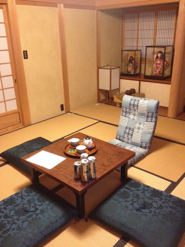 dark cushions on the floor in the japanese room