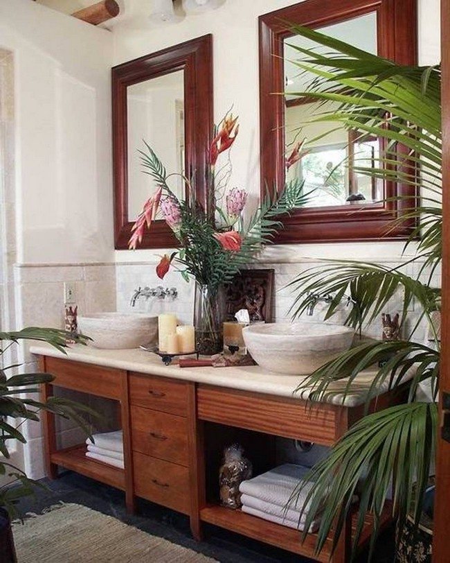 tropical bathroom with houseplants and double vessel sinks, 2 big mirorrs in the 