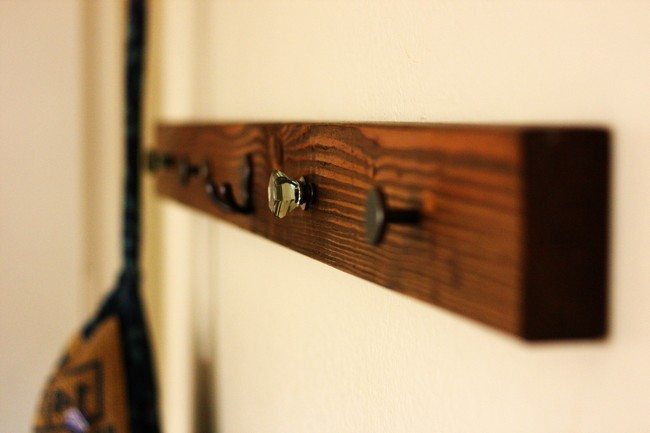 Wooden rack with nails for hanging clothes