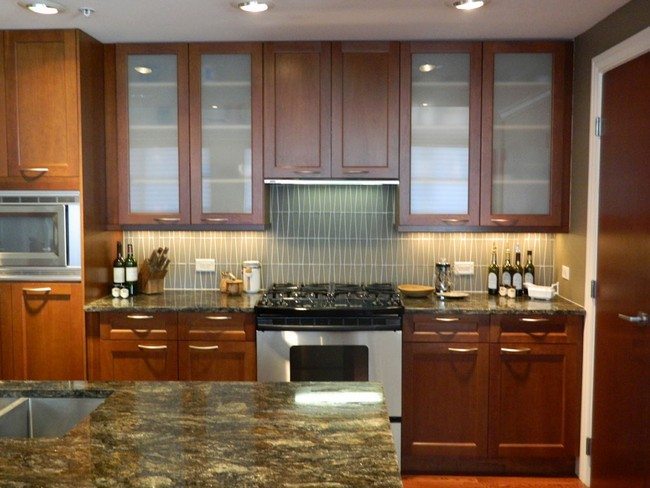 A well decorated kitchen with ample storage space