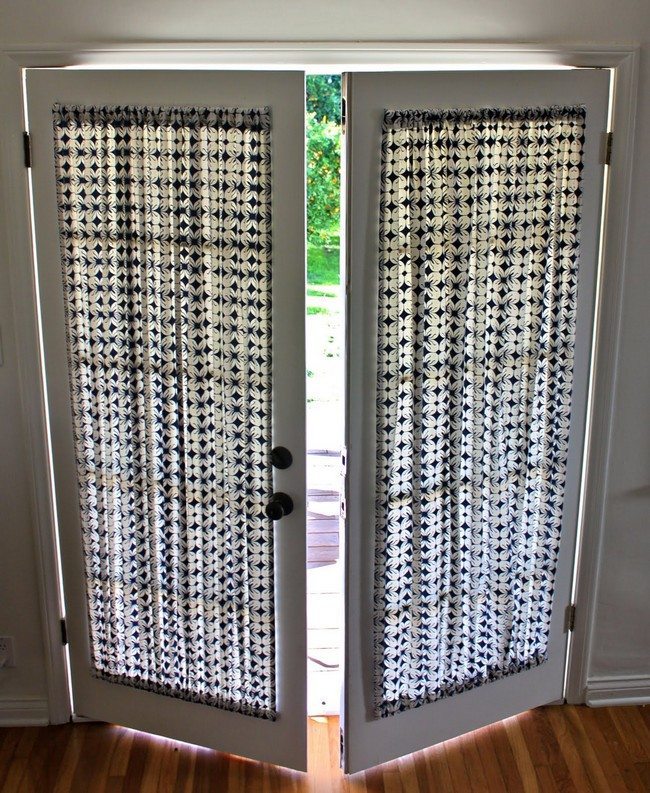 eastern french doors with striped curtains