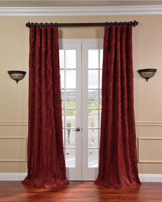 wooden french doors with velvet purple curtains