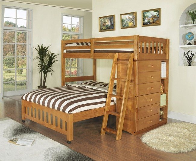 pine bank bed with striped matrasse on it and chest of drawers ont he right side