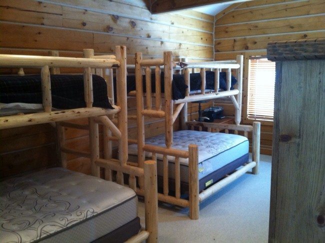 adult hostel with 2tow double bank beds made from cleared wood
