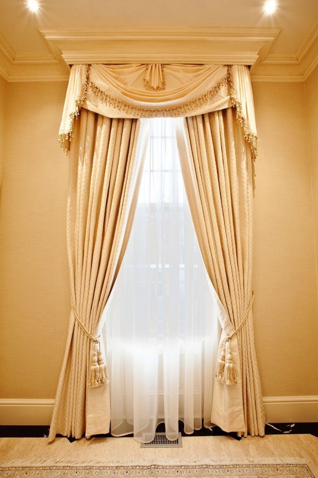 French doors in the bedroom with orange curtains