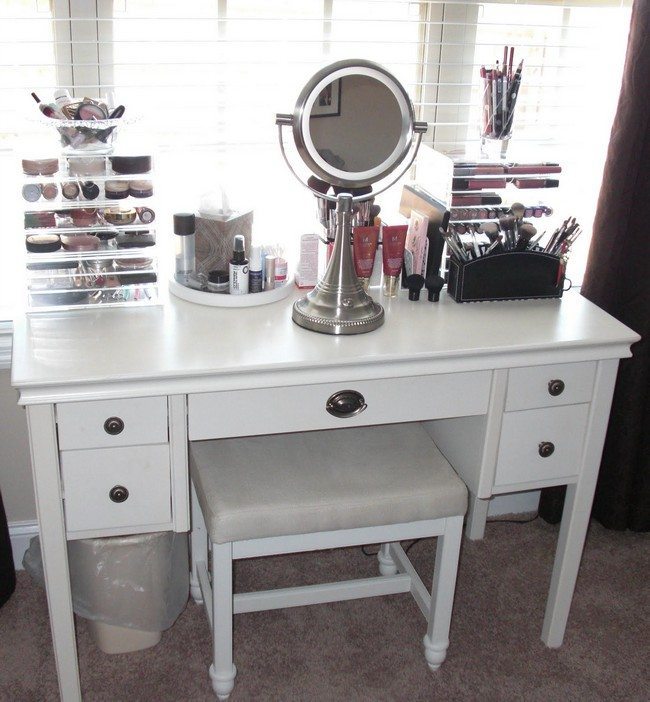 white wooden makeup storage with toe drawers on the side and small round mirror