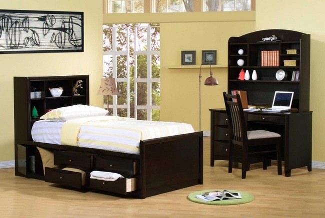 Bed with built-in storage cabinets and separate study section