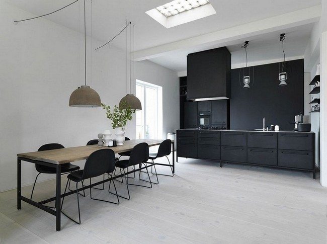 black cabinet in the white kitchen with soft chair around square table