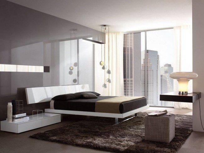 Apartment bedroom with a view of the city
