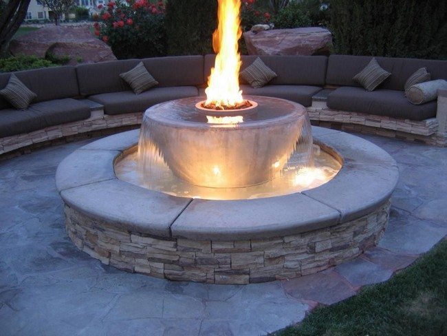 Water fountain with integrated fire pit