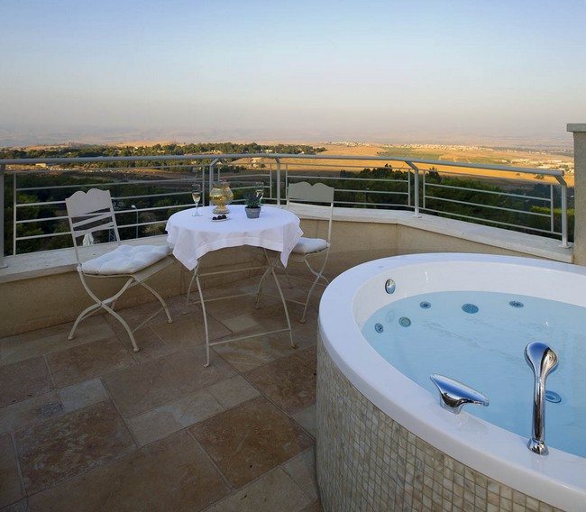 open jacuzzi with table and chairs  