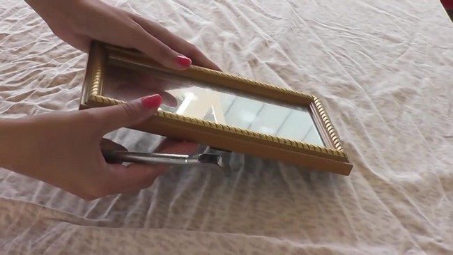Small funky mirror in rectangular frame