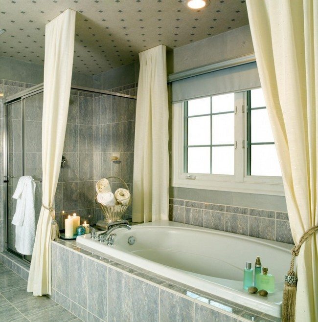 Bathroom with blue stone surfaces and large tub