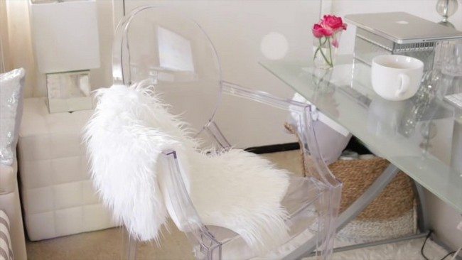 Sheep skin faux lelt covering glass chair