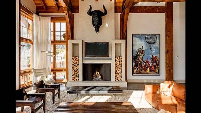 Black buffalo crown displayed above the fireplace