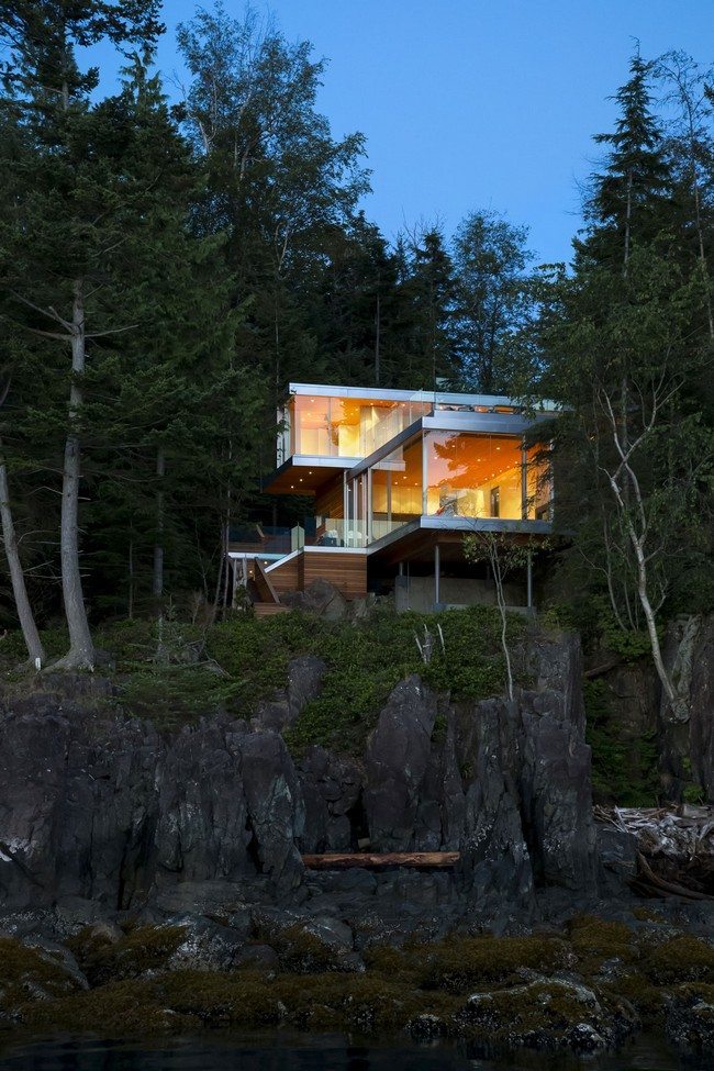 Cliff house surrounded by large trees