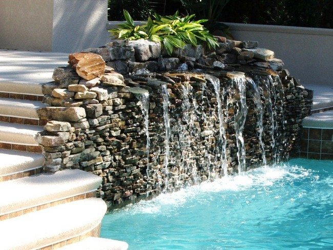 Small rocks stacked neatly to create waterfall
