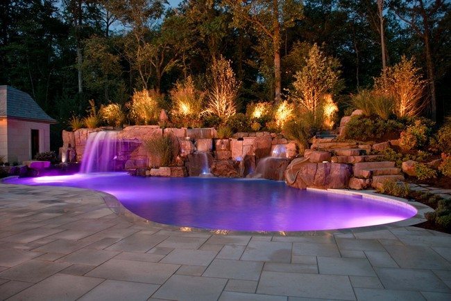 Pool waterfall combined with exotic lighting features