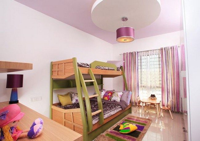 Lovely girls’ bedroom with a colorful bunk bed