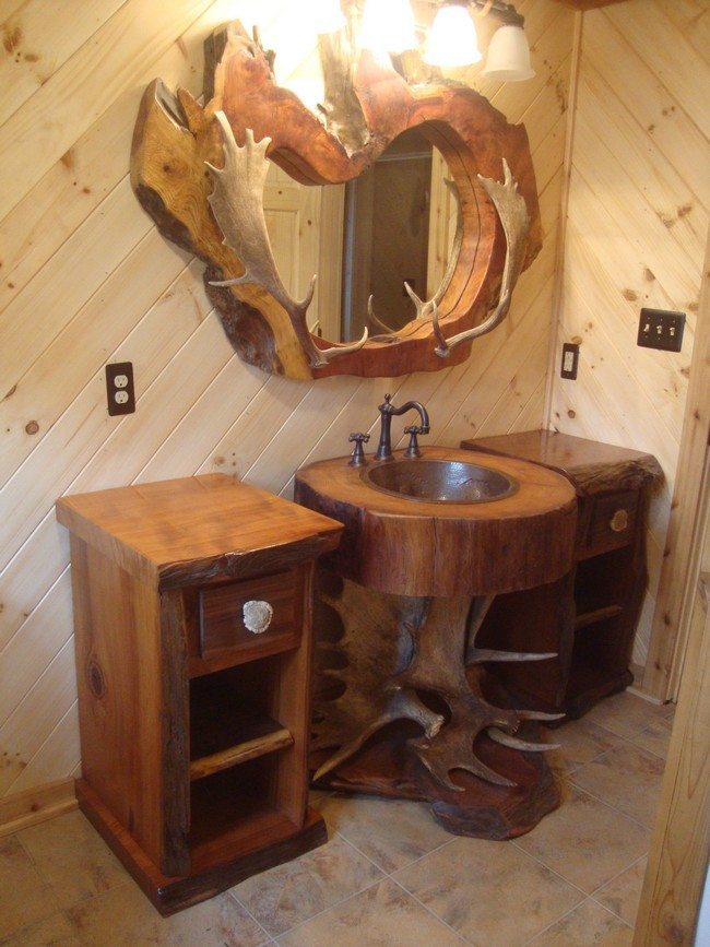 Matching wooden cabinets separated by rustic-style vanity set