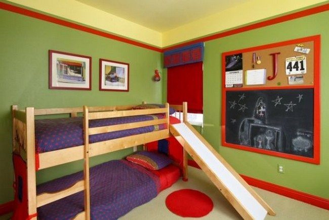Small bunk bed with a slide in a colorful kids’ bedroom 