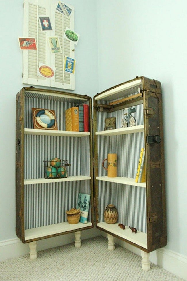Large suitcase converted into storage cabinet with white shelves
