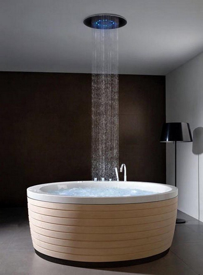 Shower over large, round unique bathtub