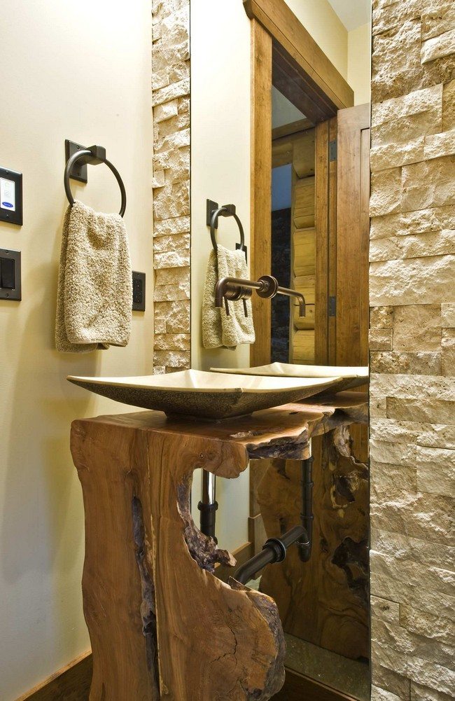 Stone stand-alone sink and metal faucets