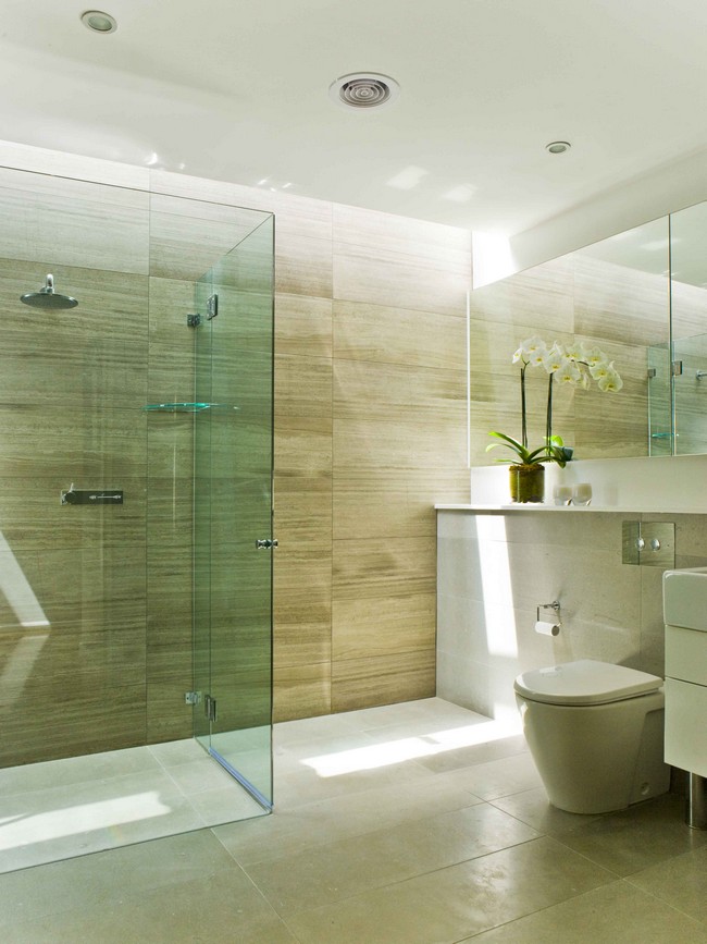 Contemporary bathroom with large, rectangular marble tiles