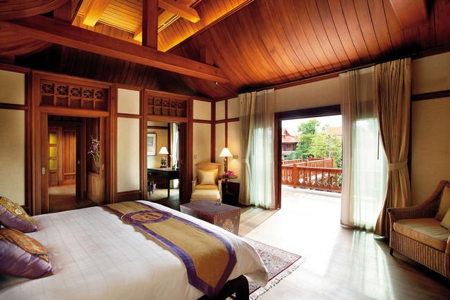 Asian-style bedroom with patio