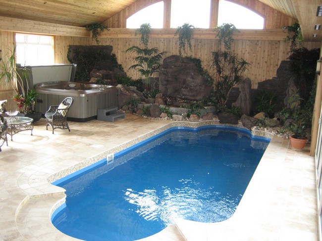Small indoor pool with rock garden