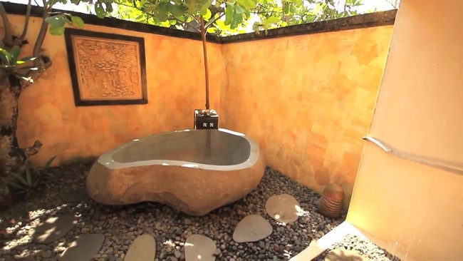 Large outdoor tub bathroom in neutral color shades