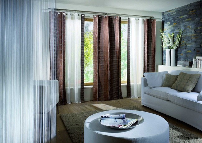Pale Blue Curtains That Contrast The Color Scheme Of The Roomliving Room Curtain Ideas