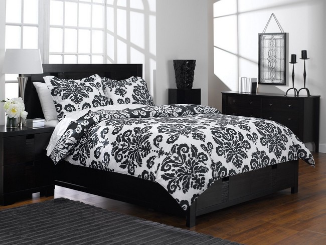 Black and white patterned bedding that adds a playful touch to the room