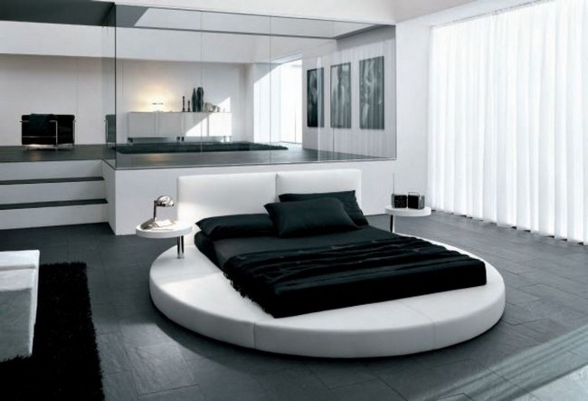 Spacious black and white bedroom with contemporary and minimalist design