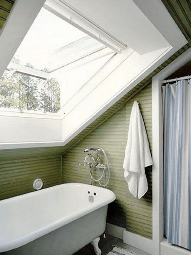 Little clutter helps this bathroom with a slanted ceiling feel more spacious