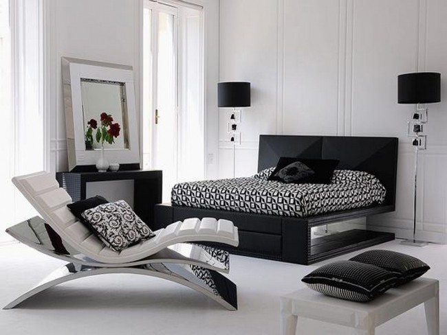 Black headboard against a white wall for a simple yet elegant appeal.