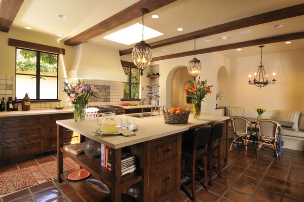 Series of wooden beams on the ceiling, a common aspect of Spanish style kitchen design