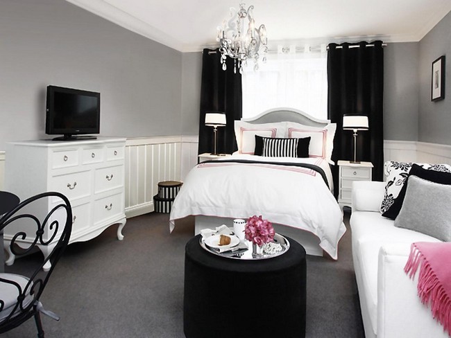 White bedroom with black accent features and accessories, creating an edgy and contemporary look