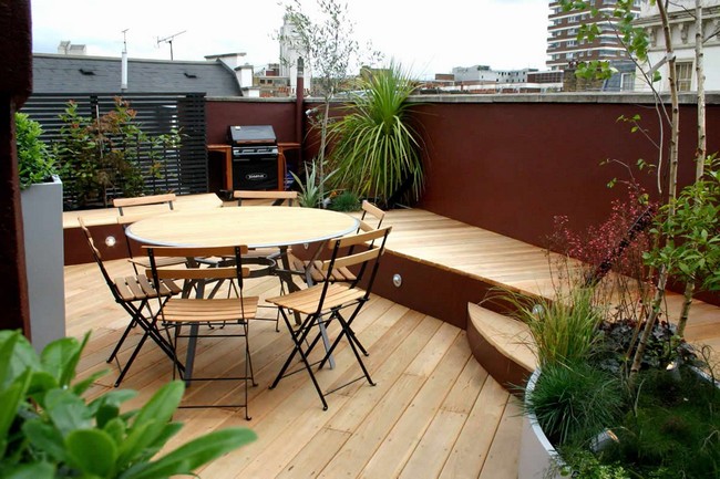 Wooden terrace with pallet furniture, perfect for outdoor dining