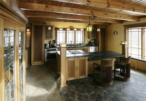 Classic Spanish style kitchen with a minimalist design, leading to a more spacious look