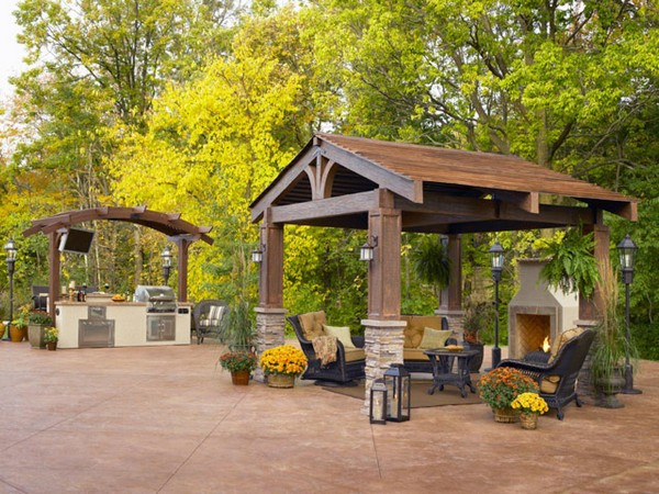 Gazebo made from stone and wood, with a medium-sized fireplace
