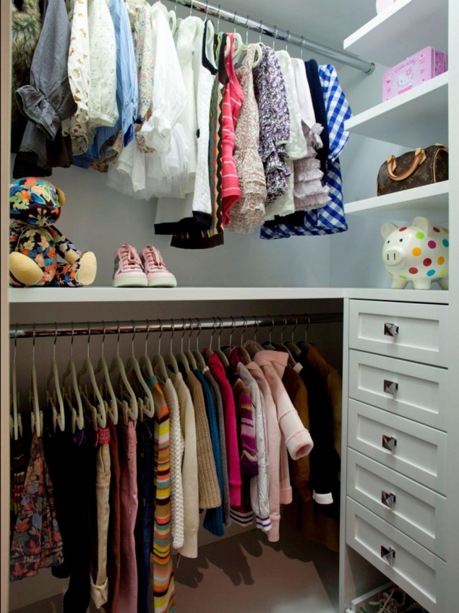 Metal rods used to hang clothes help create order and organization in this small closet