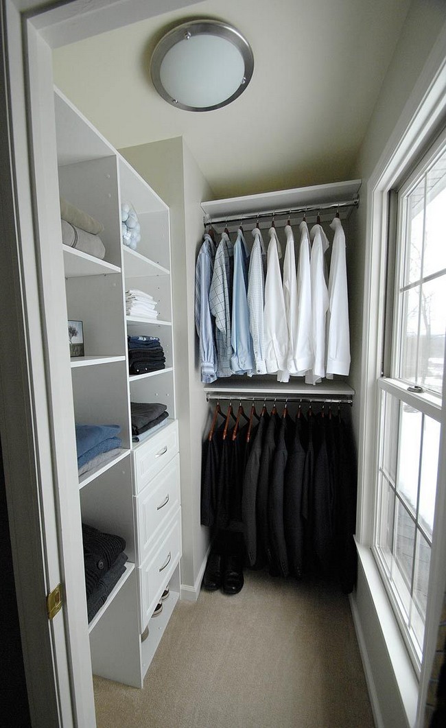 White closet that gets even brighter with the natural light coming in through the window